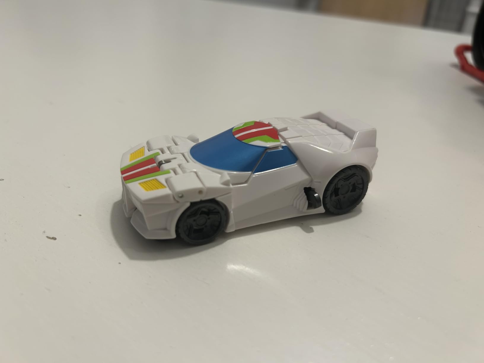 Transformers EarthSpark Wheeljack action figure 10 cm lancio