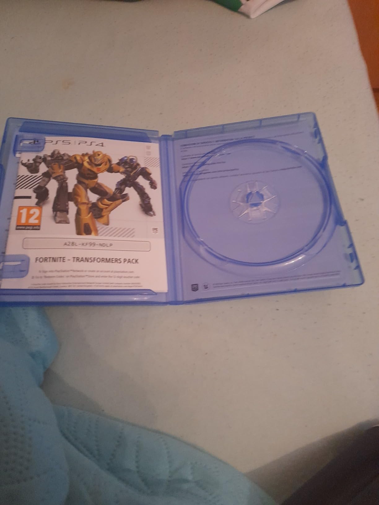 Fortnite Transformers Pack gioco PS4 Code in a Box PS4 V-Buck