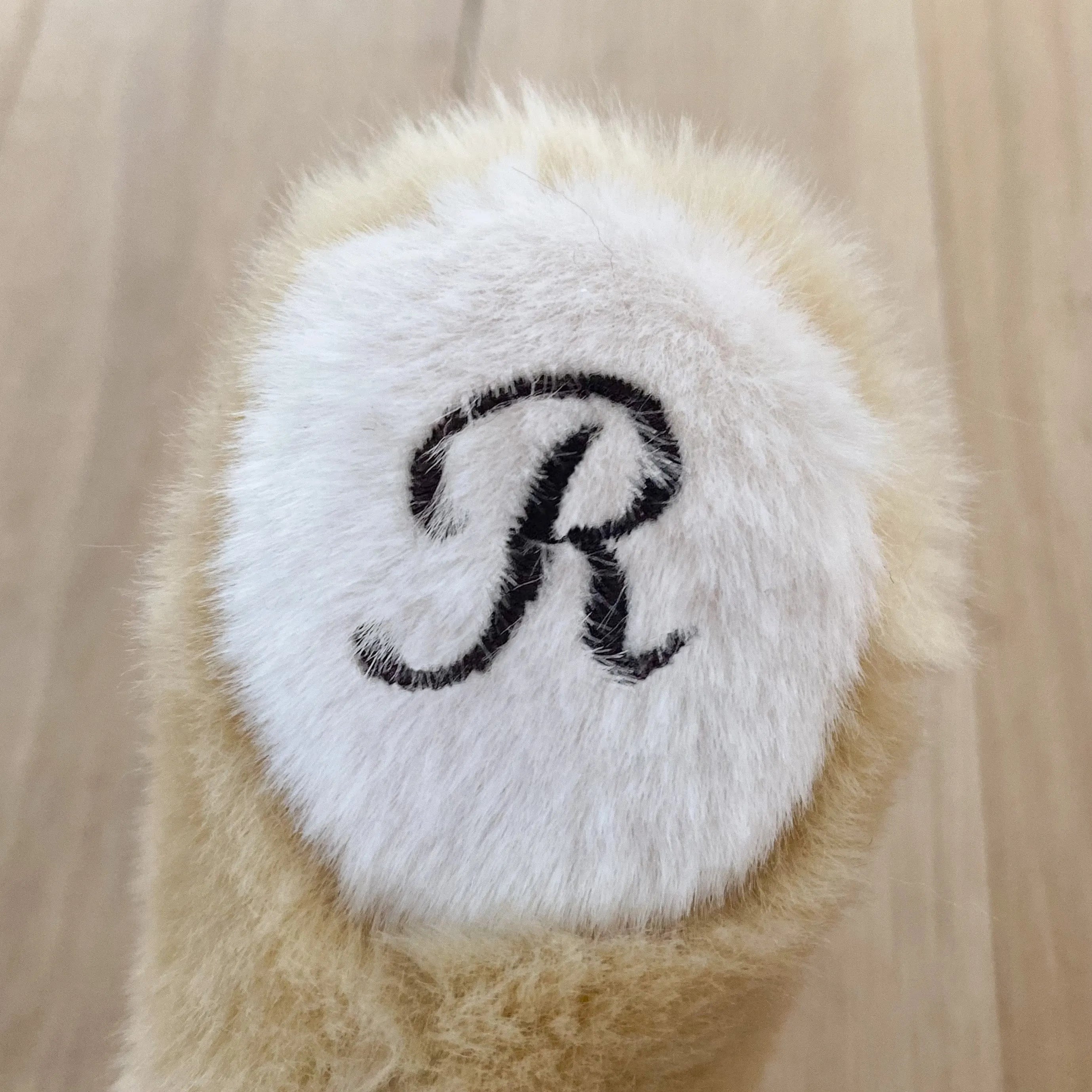 La Pelucherie Personalisation ricamo zampa Melchior accessorio